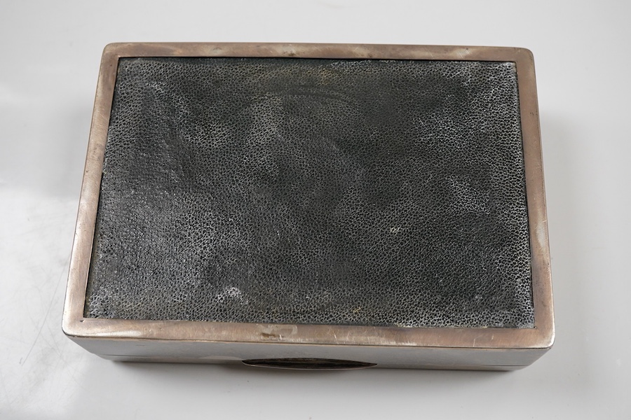 A George V engine turned silver mounted rectangular cigarette box, by William Neale Ltd, Birmingham, 1935, 16.2cm.
